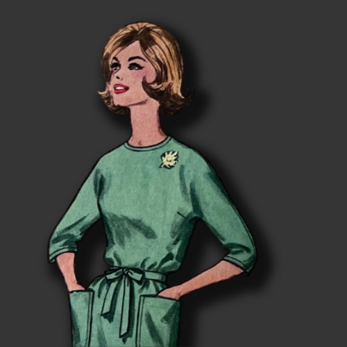 1960s lady in green dress with tie belt